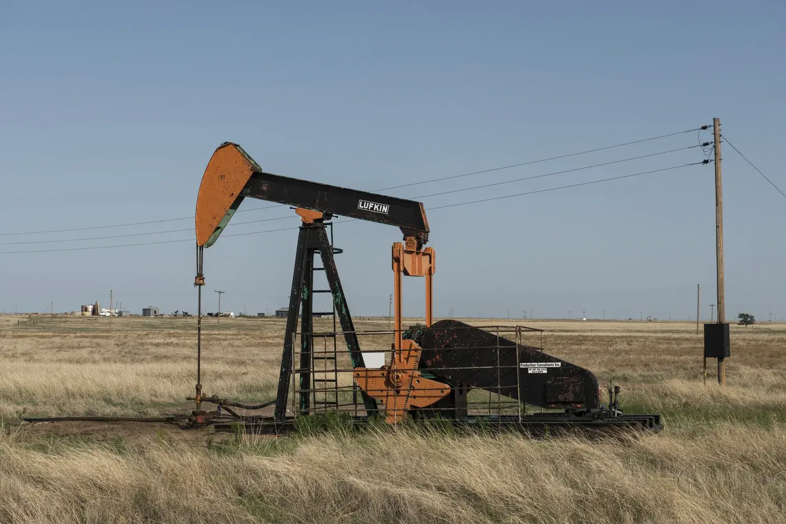 Pump jack drawing oil on a working lease