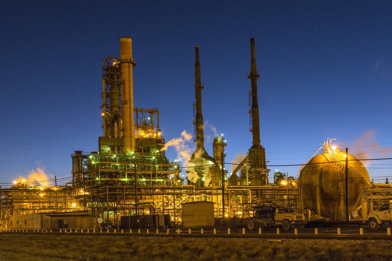The Valero refinery at Port Arthur, Texas, at dusk, far downstream of the well where royalty is often valued