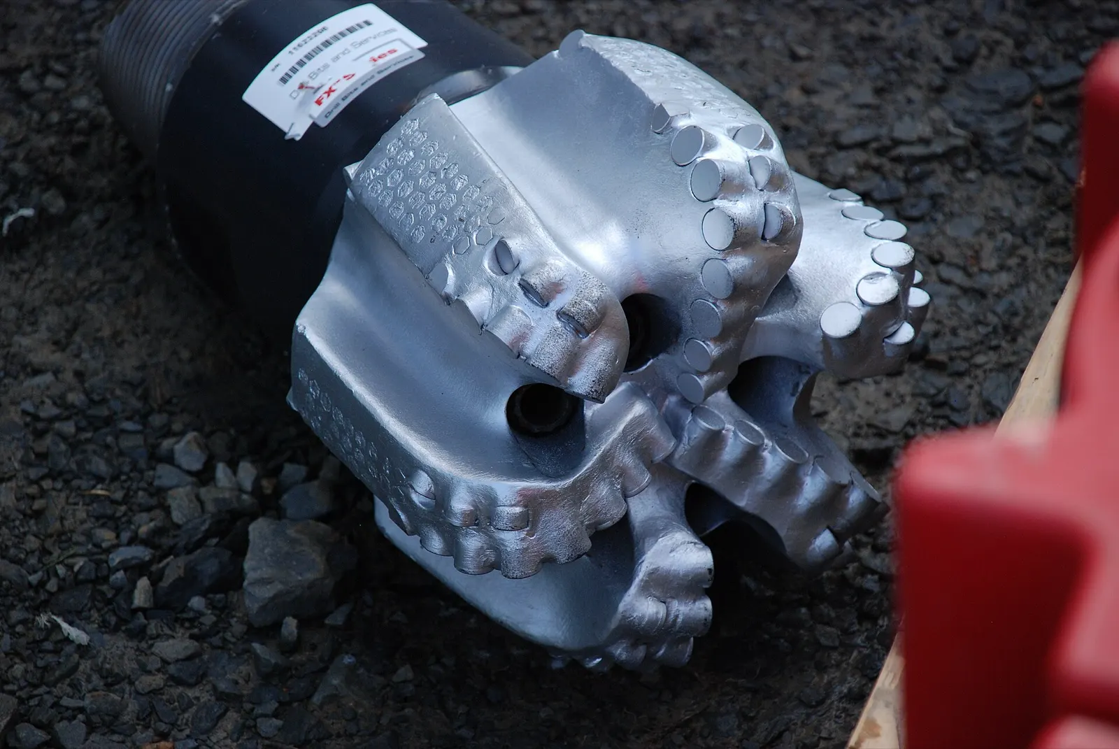 Sell mineral rights in Arkansas: a drill bit on the ground at a natural gas well site in the Fayetteville Shale of Arkansas
